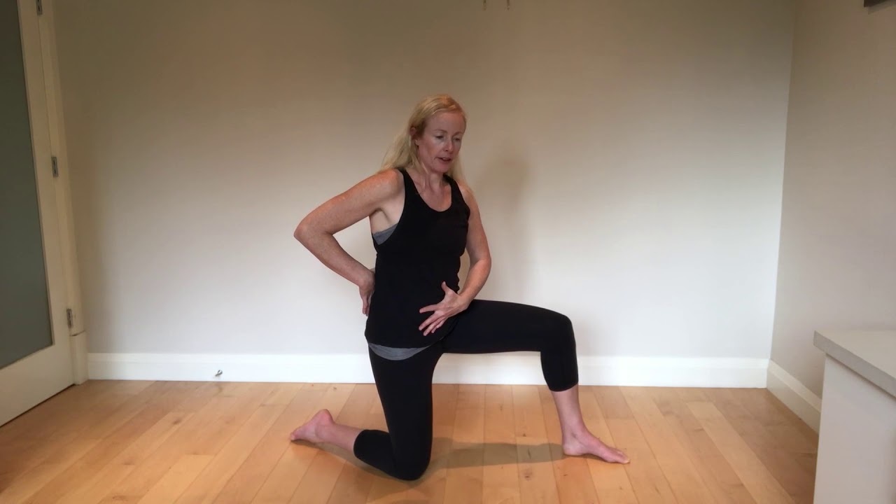 Half kneeling hip end range rotational training