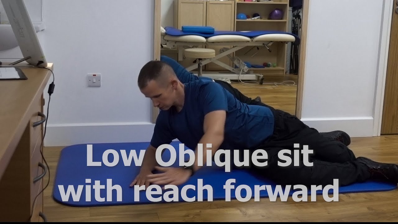 Low oblique sit with reach forward
