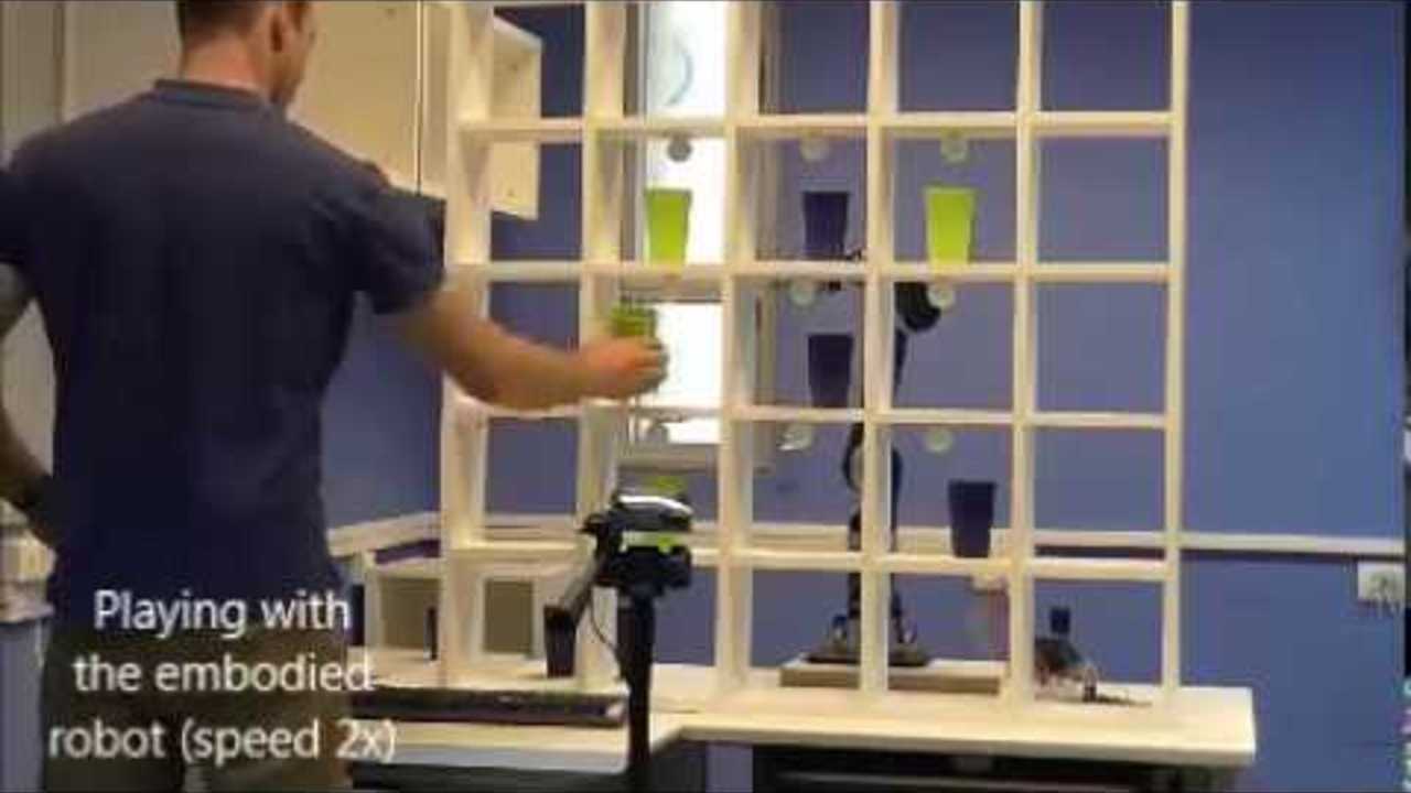 Game with a robotic arm to simulate 3D functional activities of daily living
